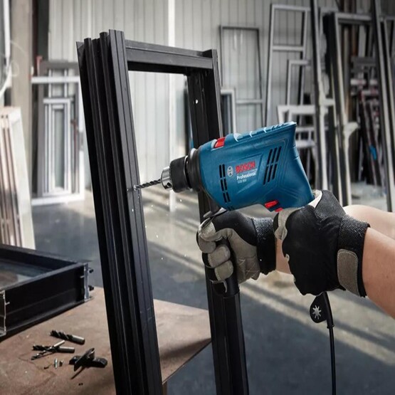 Bosch GSB 600 Profesyonel Darbeli Matkap (100 Parça Aksesuar Hediyeli)